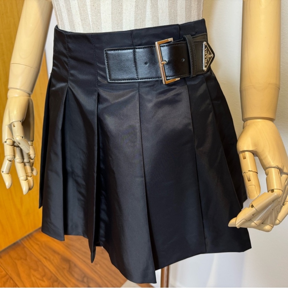 Iconic Prada nylon, pleated skirt with buckle closure